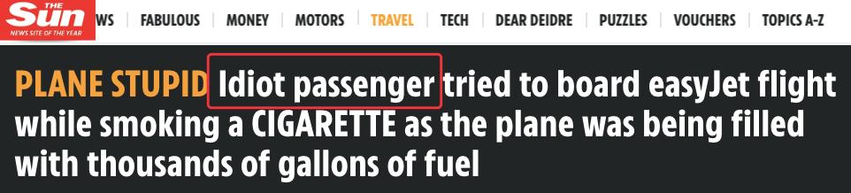 「环球网」飞机正在加油，一位登机的乘客点燃了一根烟