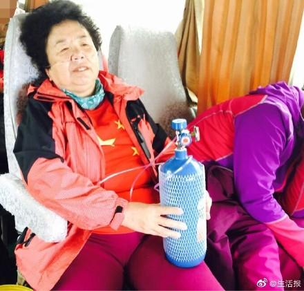 「光明网」问你服不服！南极冰泳 北极探险 这位大妈还要去赤道