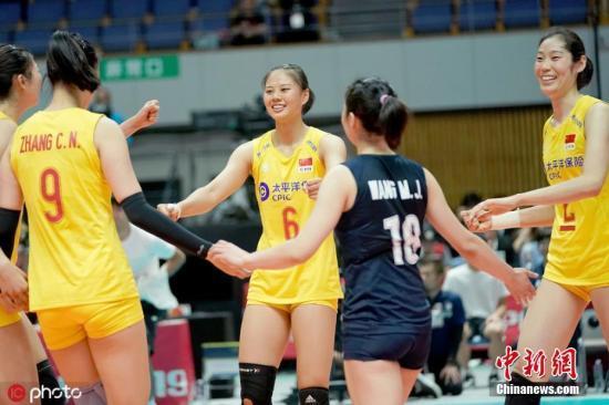 中国新闻网@冠军是如何炼成的？4关键词解析女排世界杯卫冕路