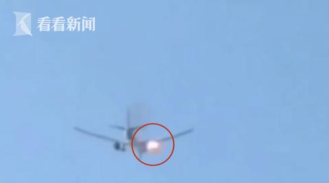 「海外网」一波音777客机引擎喷火冒烟 起飞后紧急返航