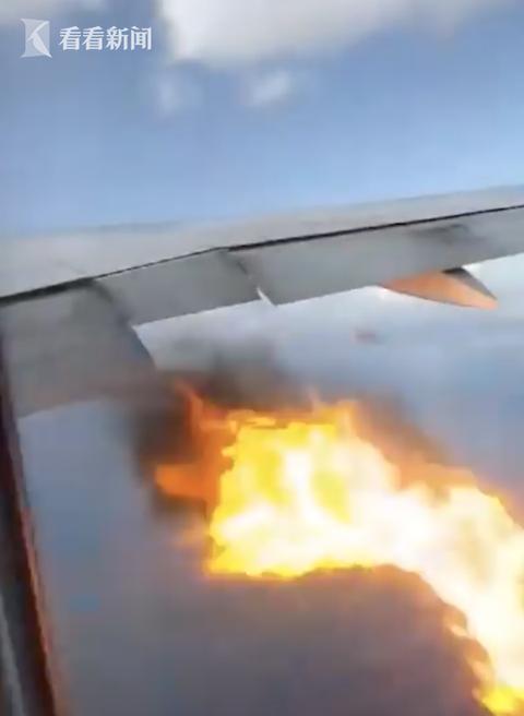 「海外网」一波音777客机引擎喷火冒烟 起飞后紧急返航