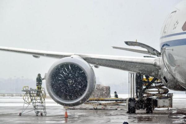 [光明网]今天北京迎首场降雪，坐飞机的旅客看过来