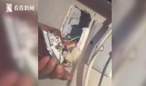 「光明网」插座反射红光！小情侣住酒店 发现摄像头正对着床