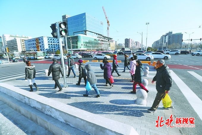 [北京晚报]为自行车设专用绿灯！北京这些路段交通管理用上“绣花”功夫