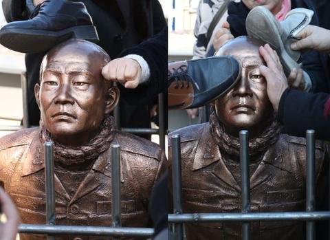 【海外网】韩国前总统全斗焕跪像被竖在广场 大叔大妈用脚踹