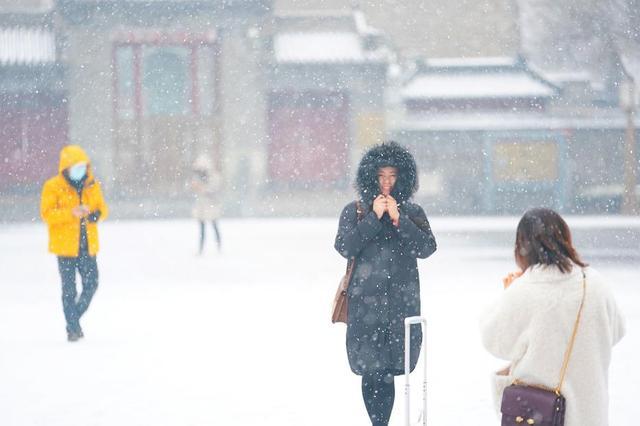 「北京日报客户端」北京最新天气预报：北风今夜起，明天最低零下7℃