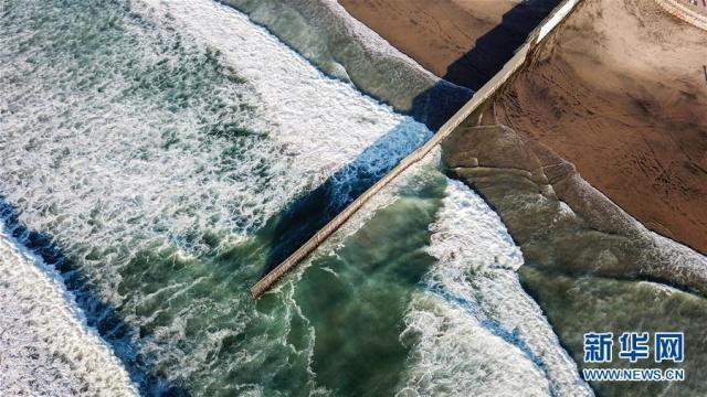 「海外网」海外网评：100英里的“特朗普墙”，注定是摆设