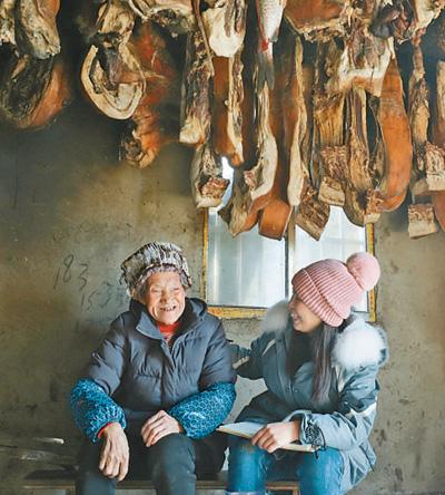 人民网■村庄绘纸上 村民放心上