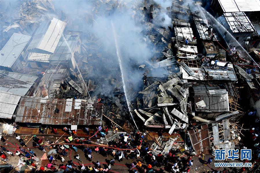 【国际社会】孟加拉国首都贫民区大火导致200间简易房被毁