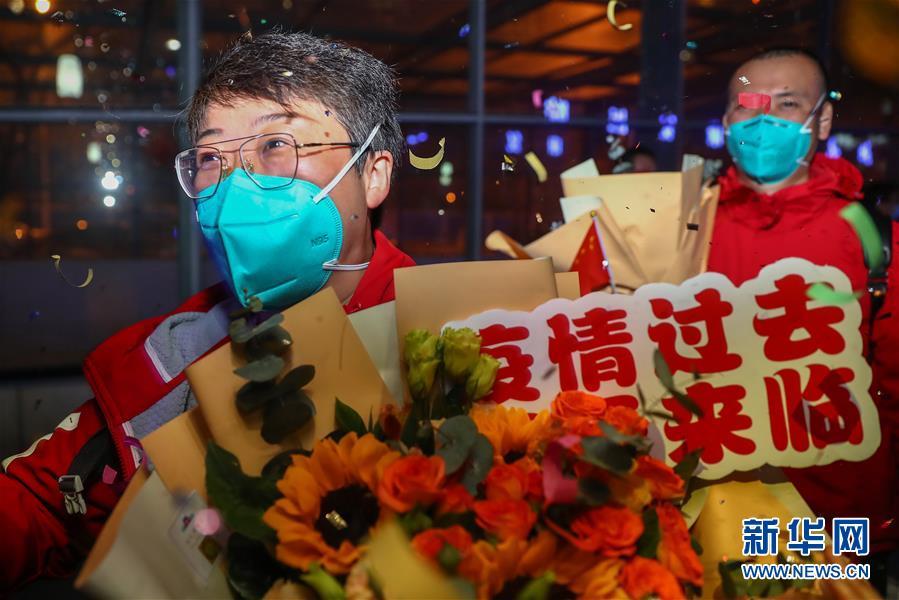 医疗：部分援鄂国家医疗队队员抵京