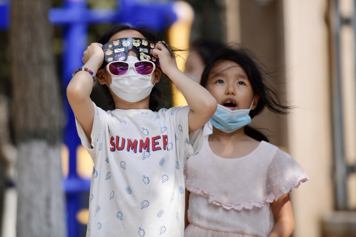 日食|北京:市民观测日食各有“高招”