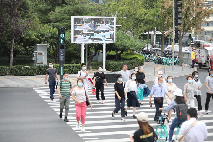 北京日报|绿灯时长得够过马路!精细治理要多动“微创手术”