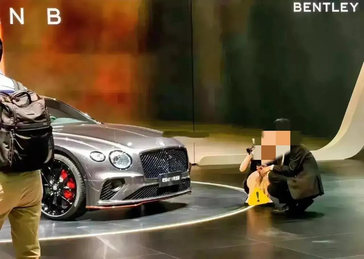 三问上海车展宾利女销售不雅照事件是否被造黄谣也该有个说法