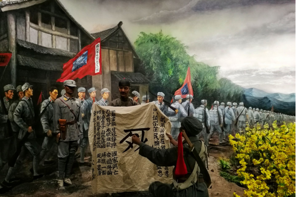 军阀挥师北上抗日,20万市民夹道相送,父亲为儿出征题词