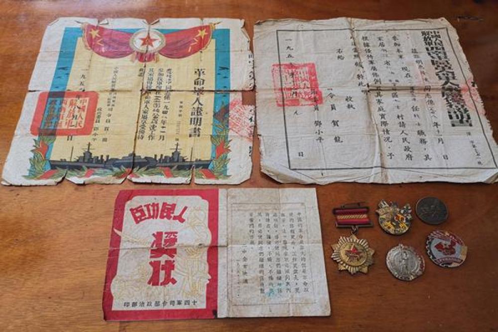 【经济日报】一枚纪念章背后，是一位深藏战功70年的老人