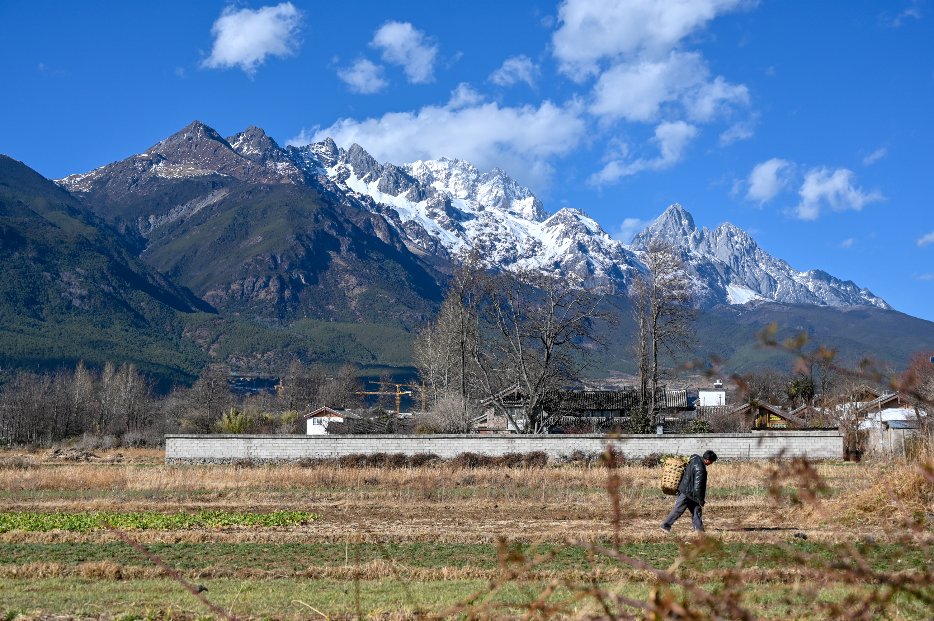 丽江最低调的古镇隐藏在玉龙雪山脚下如世外桃源般遗世而独立
