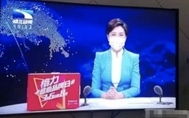 [环球时报]口罩一定要戴！但这张图不是戴口罩播新闻