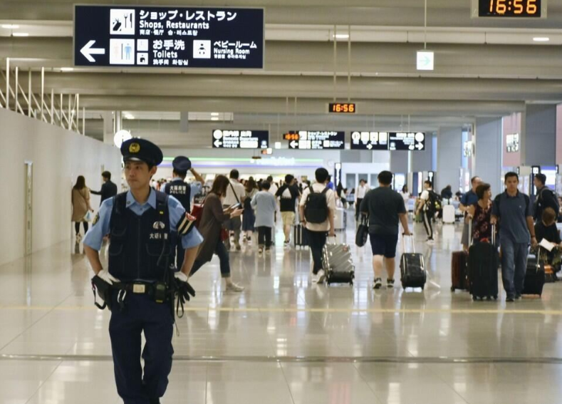 环球时报■涉嫌诈骗后潜逃，中国男子为买口罩返回日本后被逮捕