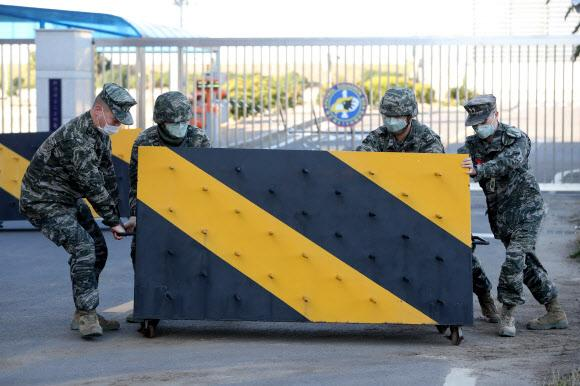 环球时报@新冠肺炎在韩军营区传播，确诊增至11例，7700余人隔离